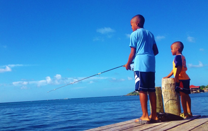 Two local lads fishing - successfully!