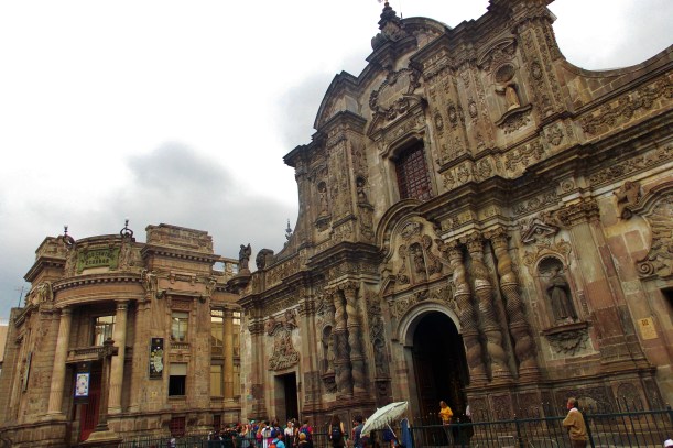Church of the society of Jesus (A church covered in gold inside) next to the National Bank of Ecuador