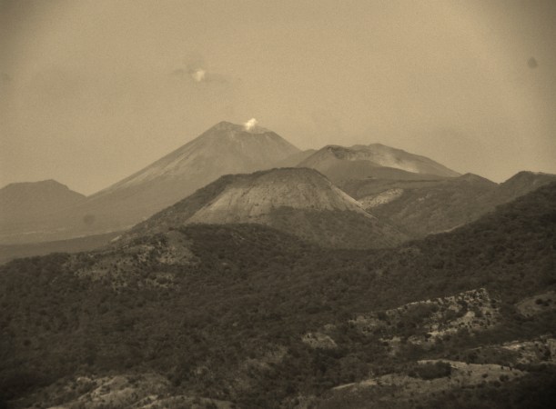 Some of the nearby volcanoes that line through the country visible from the top