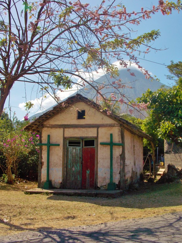 Tiny church under cherry blossom near Santo Domingo