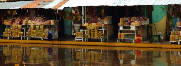 Sugar cane toffee called Melcocha is for sale at every turn in town in Banos